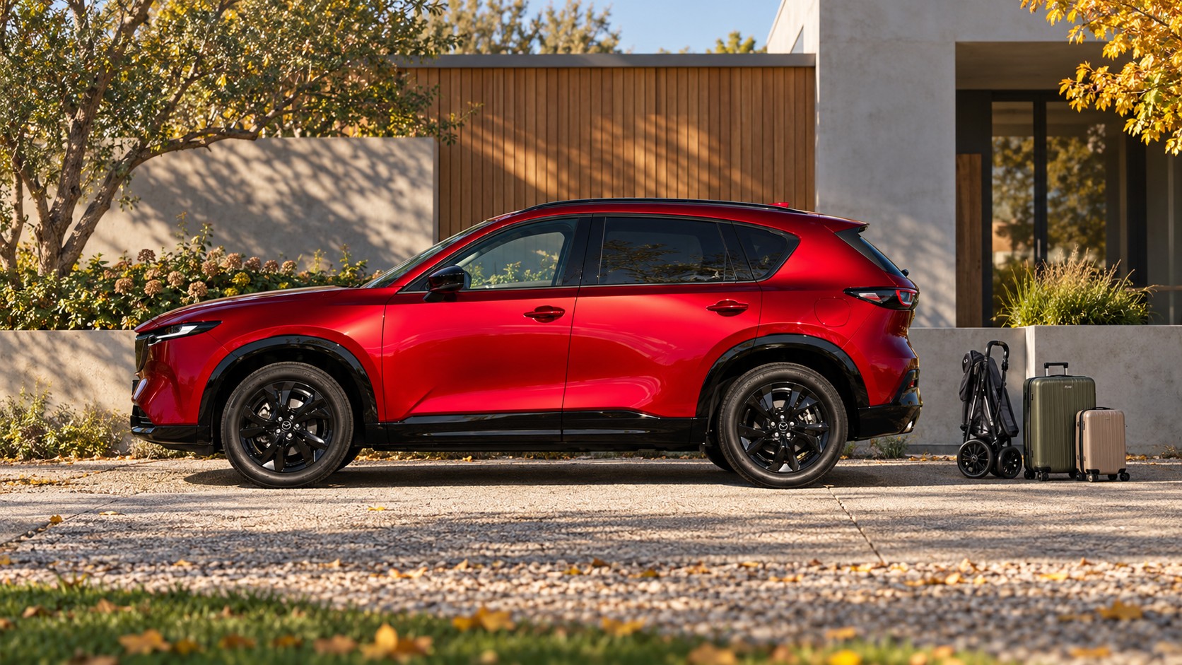 Иллюстрация Mazda CX-5 третьего поколения рядом с дорожными сумками